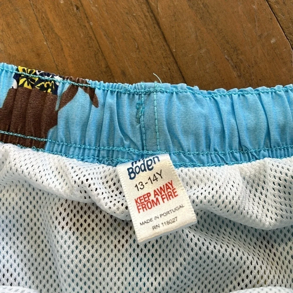 Mini Boden surfing dog swim trunks